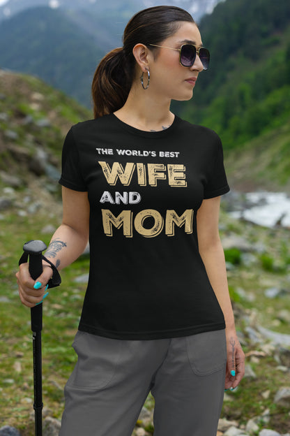 Funny The World’s Best Wife and Mom T-shirt, gildan-t-shirt-mockup-featuring-a-woman-on-a-mountain-with-a-hiking-stick