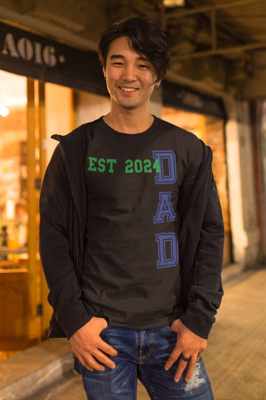 Funny Dad Est 2024 Cool T-shirt, happy-asian-man-wearing-a-round-neck-tshirt-template-while-in-the-street