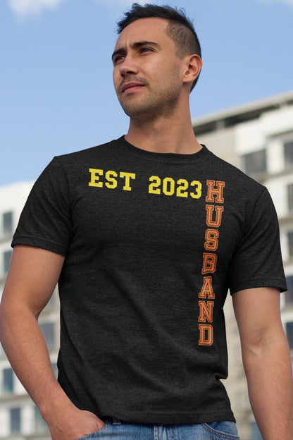 Funny Husband Est 2023 Cool T-shirt, heather-t-shirt-mockup-of-a-young-man-walking-around