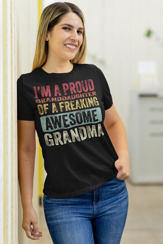 Vintage Funny I’m a Proud Granddaughter of a Freaking Awesome Grandma Retro T-shirt, mockup-of-a-smiling-woman-wearing-a-round-neck-bella-canvas-t-shirt