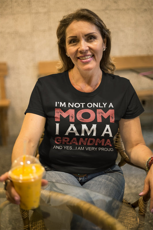 Funny I’m not only a Mom I am a Grandma, and yes…I am very Proud T-shirt, smiling-senior-woman-wearing-a-t-shirt-mockup-having-a-smoothie-at-the-coffee-shop