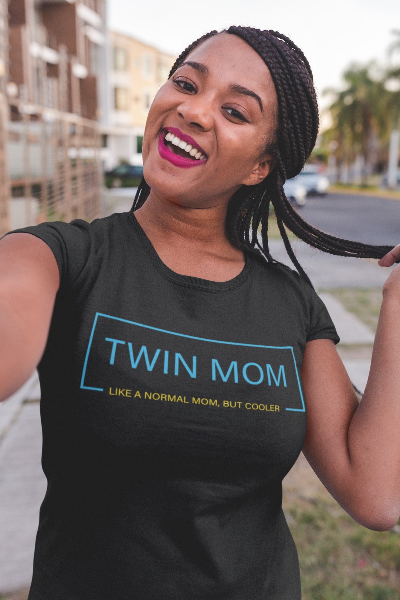 Funny Twin Mom T-shirt, tshirt-mockup-of-a-girl-with-braids-taking-a-selfie-on-the-street